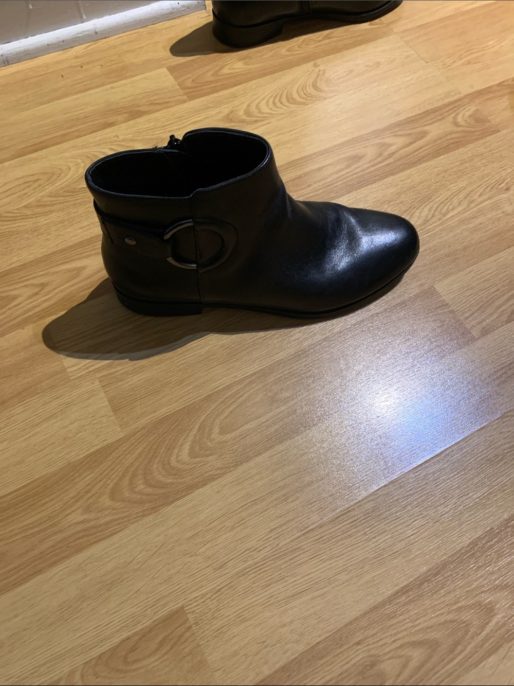Classic Black Leather Ankle Bootie with Decorative Buckle
